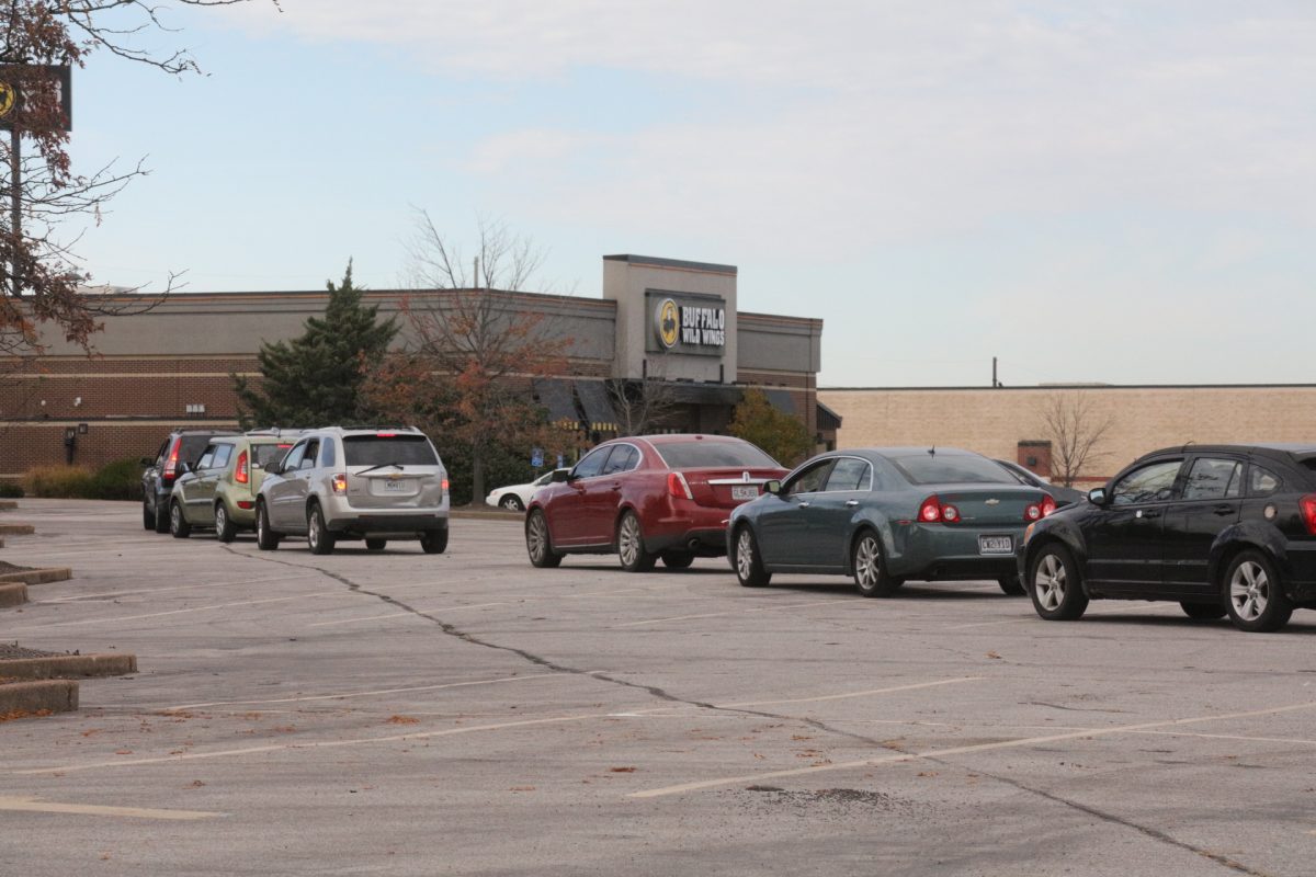 Cars wrapped around the parking lot as their drivers waited to get their food. At Rep. Jim Murphy's last food distribution event, he was forced to turn away 100 cars when supplies ran out.