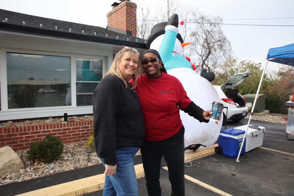 Jenny Michaud and Angie Liggins smile outside of Crisis Aid International, 5427 Telegraph Road, happy with the 2025 Crawl's outcome.