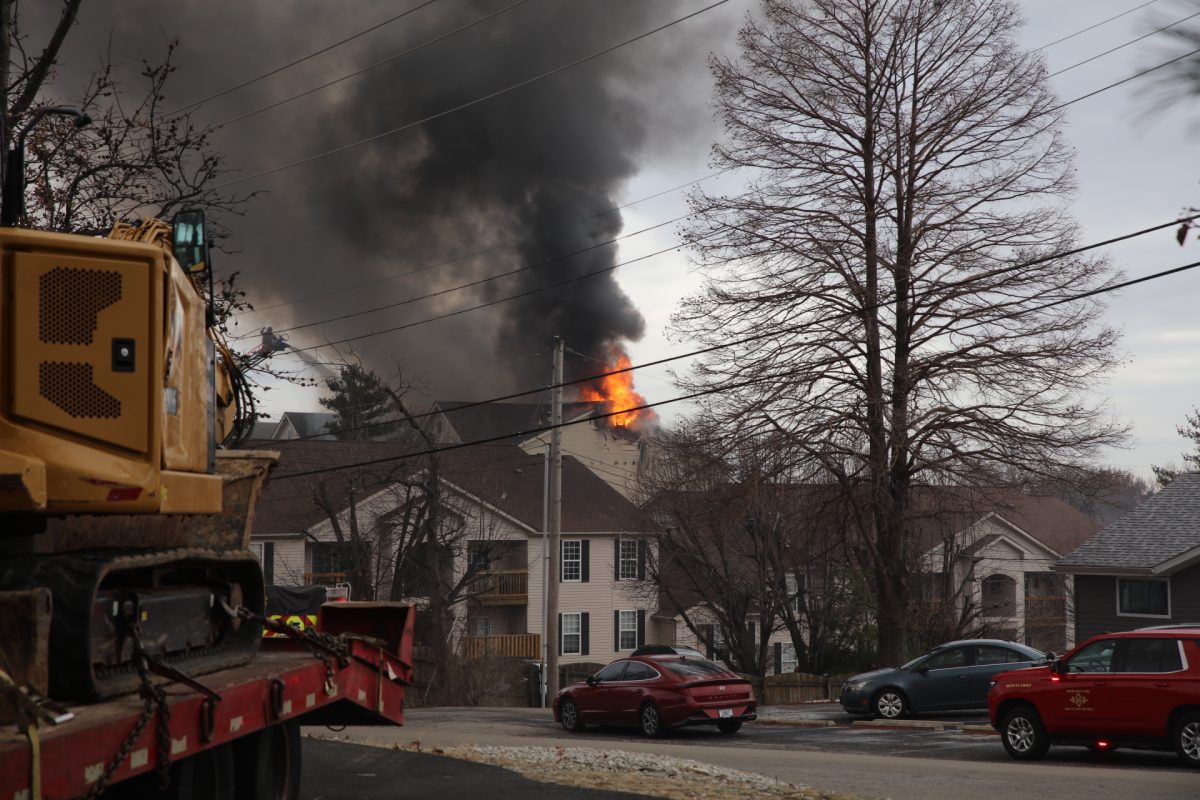 The fire could be seen emerging from the upper floor of the Arthur Commons Condominiums, 9940 Arthur Lane. By best estimates of those present, it started around or shortly after 2 p.m.