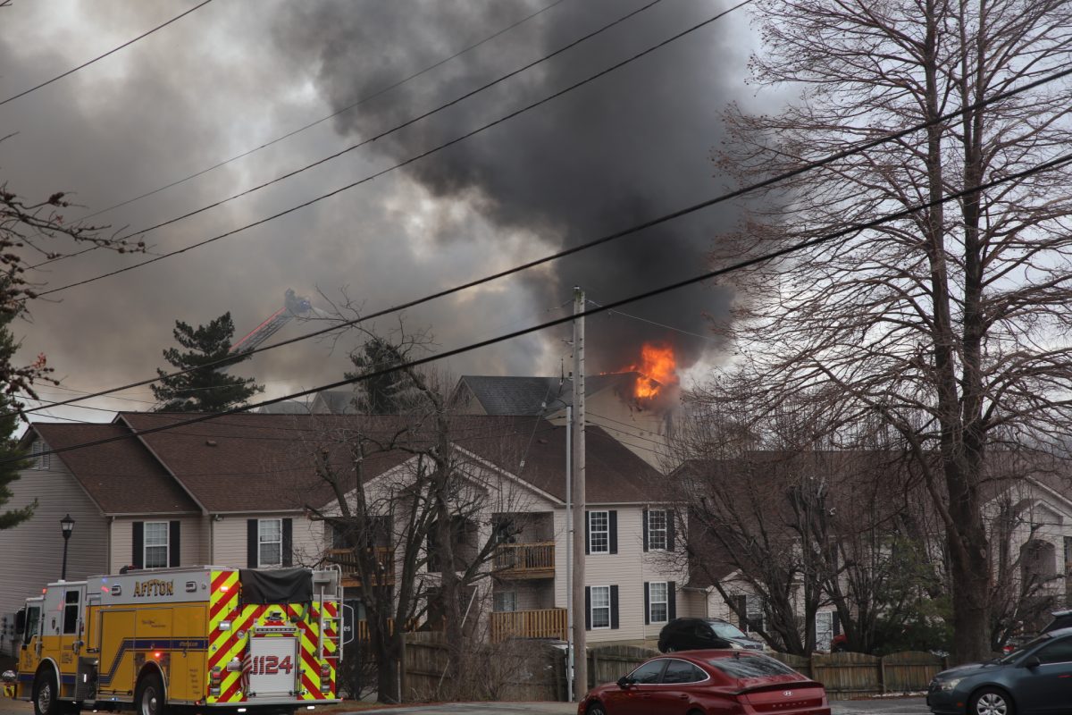 The fire could be seen emerging from the upper floor of the Arthur Commons Condominiums