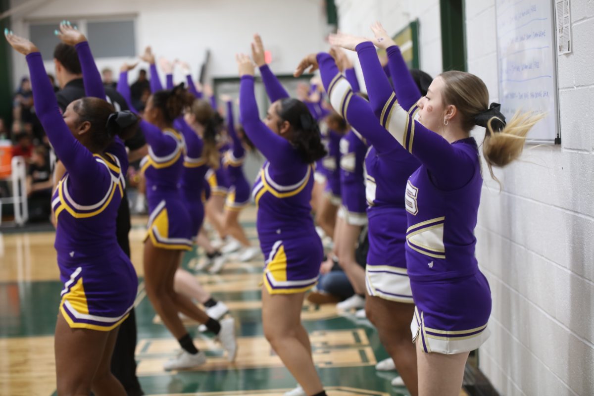 Affton's cheerleaders motivate their team with chants and dances.