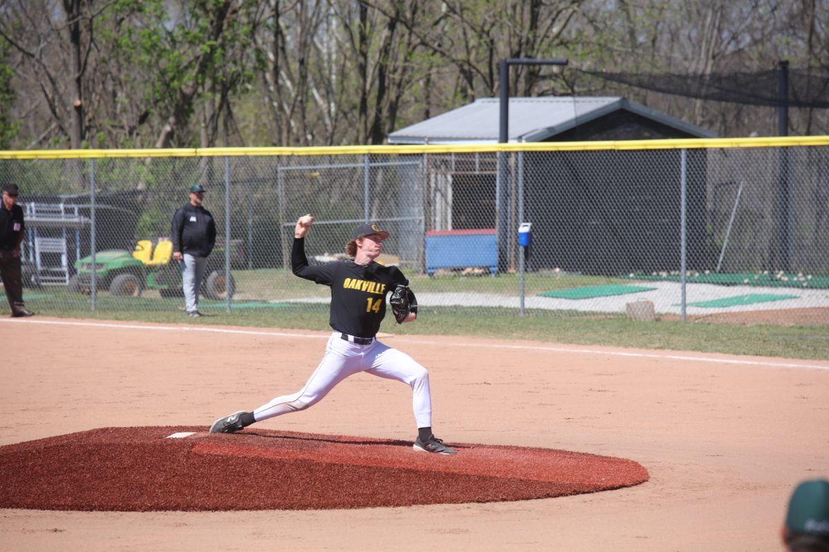 The Oakville Tigers pitcher throws to Mehlville's batter on April 6.