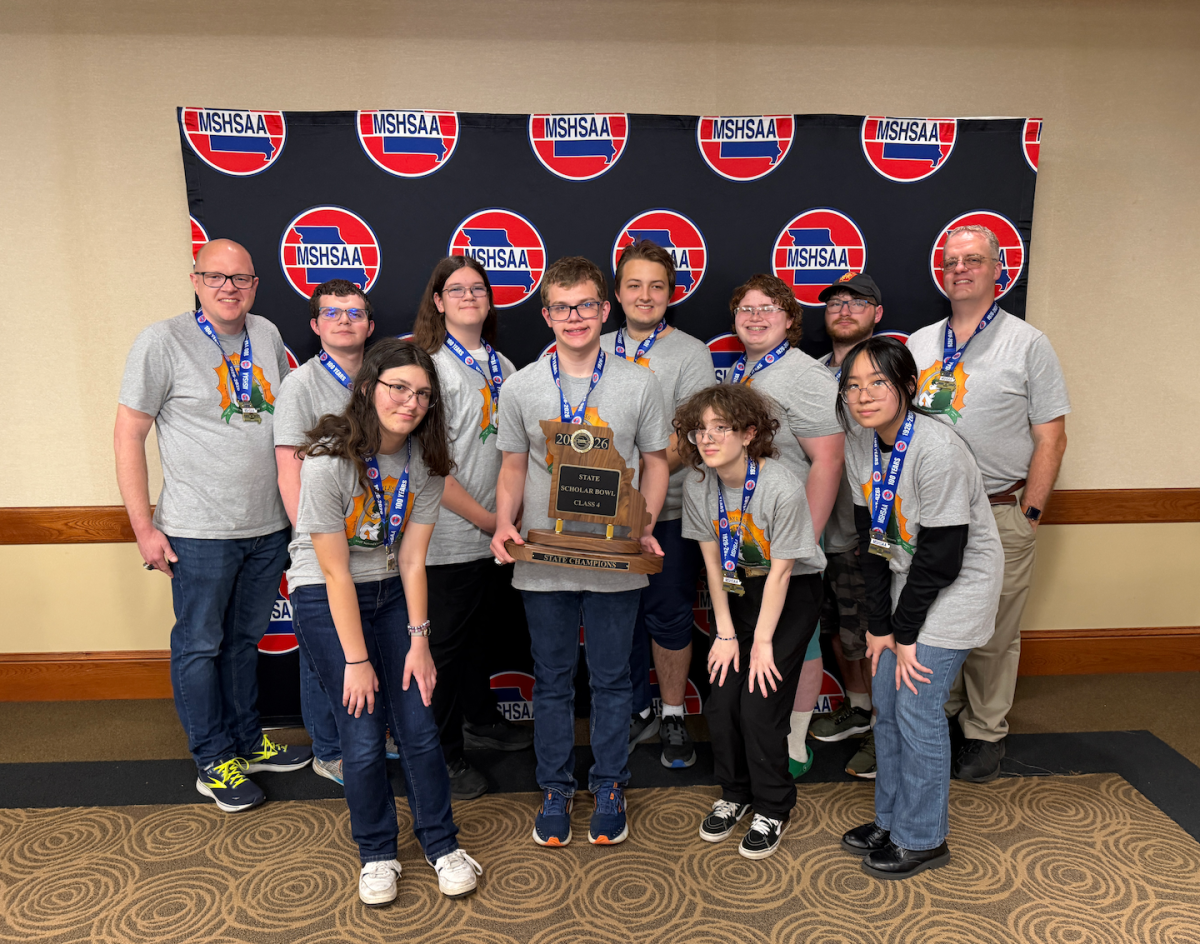 Members of the Bayless Scholar Bowl team pose with the Class 4 State Scholar Bowl Champions award. Photo courtesy of Bob Efken.