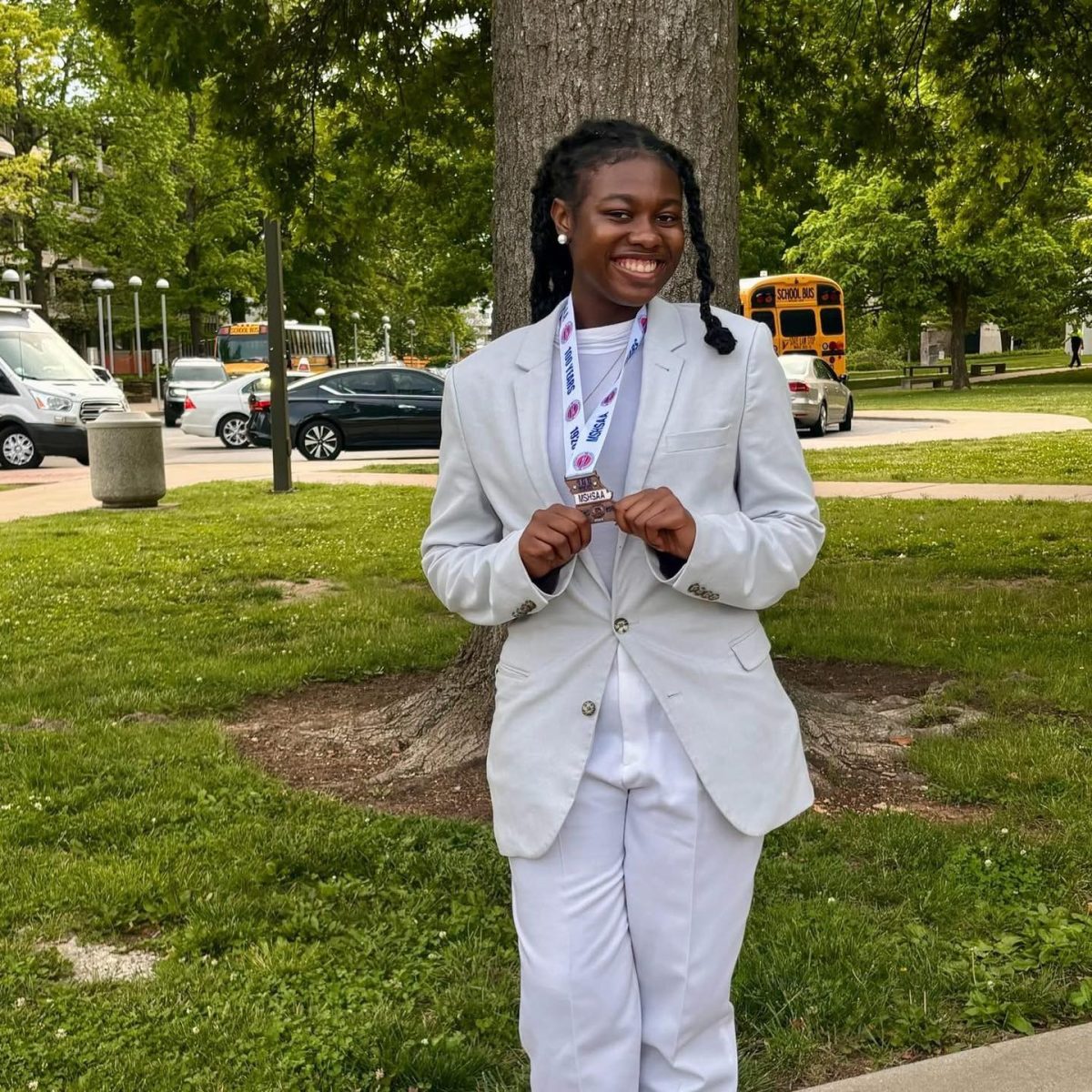 Lealua Naabien poses with her medal from the speech and debate state championship. Photo courtesy of Affton School District.