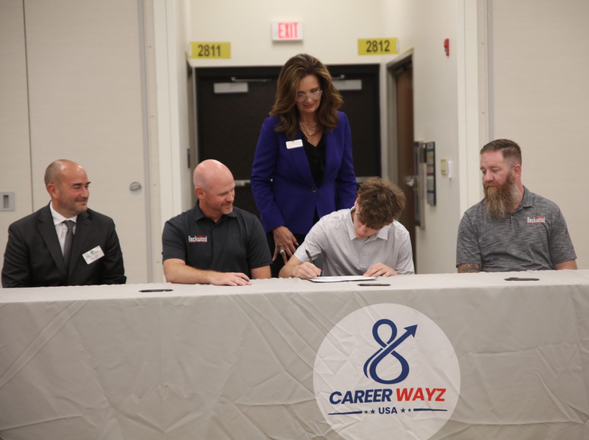 Oakville High School's Clayton Waggoner signs with Beckwood Press.