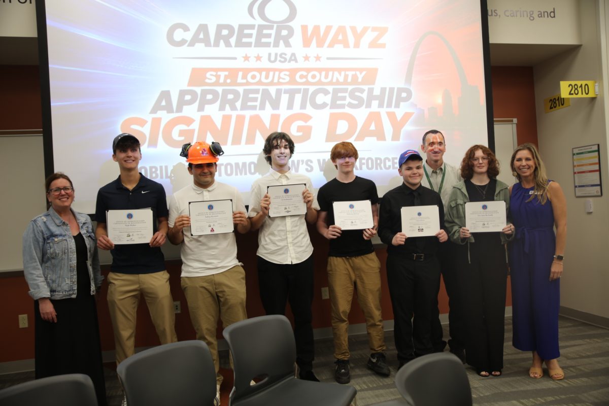 The six Lindbergh High School students who accepted apprenticeships in advanced manufacturing on May 26. From L-R: Tara Sparks, Chief Academic Officer of Lindbergh Schools; Nick Weber, Sadeq Alyasseri, CJ Stathopulos, Nick Burton, Caden Sullivan and Era-Ann McAnally.