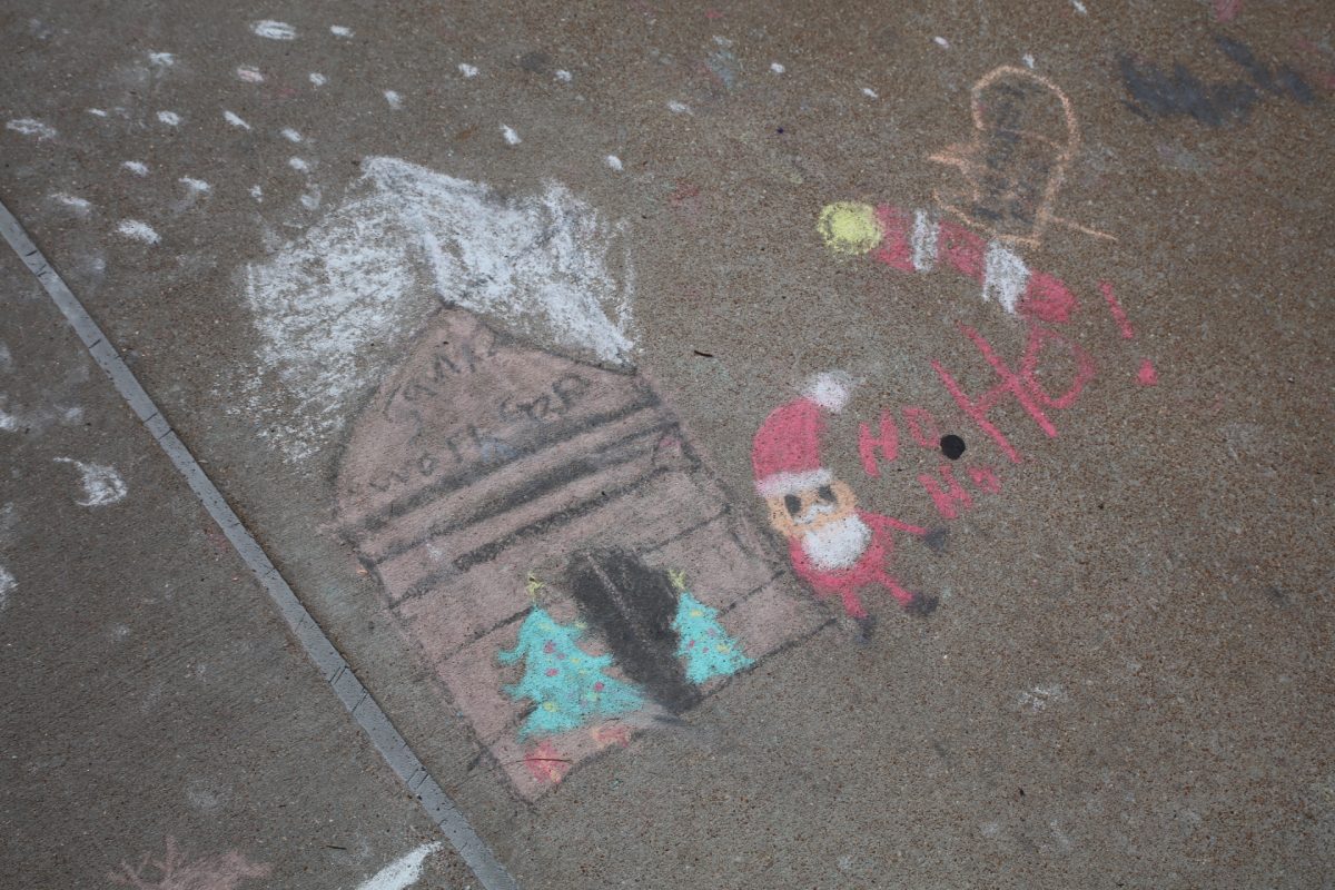 The concrete surrounding the pools at the Crestwood Aquatic Center was full of Christmas-themed chalk doodles.