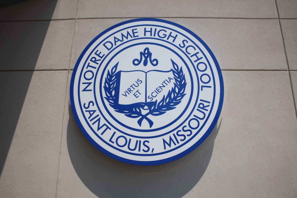 Notre Dame High School's logo is displayed on the side of its new building.