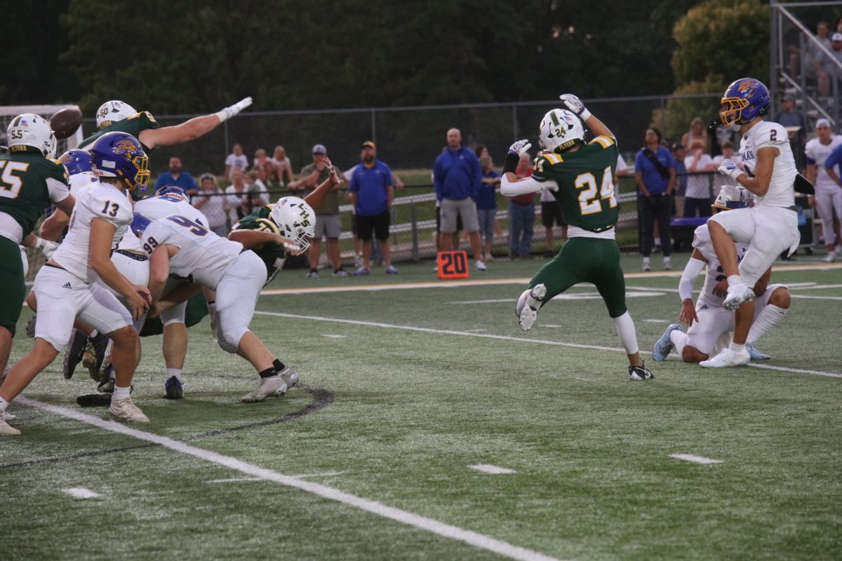 Following the first responders and military appreciation celebrations, the Flyers took the field against Seckman. Pictured above, Lindbergh's CJ Luczak (#24) is airborne in an attempt to block a Seckman player from catching the ball.