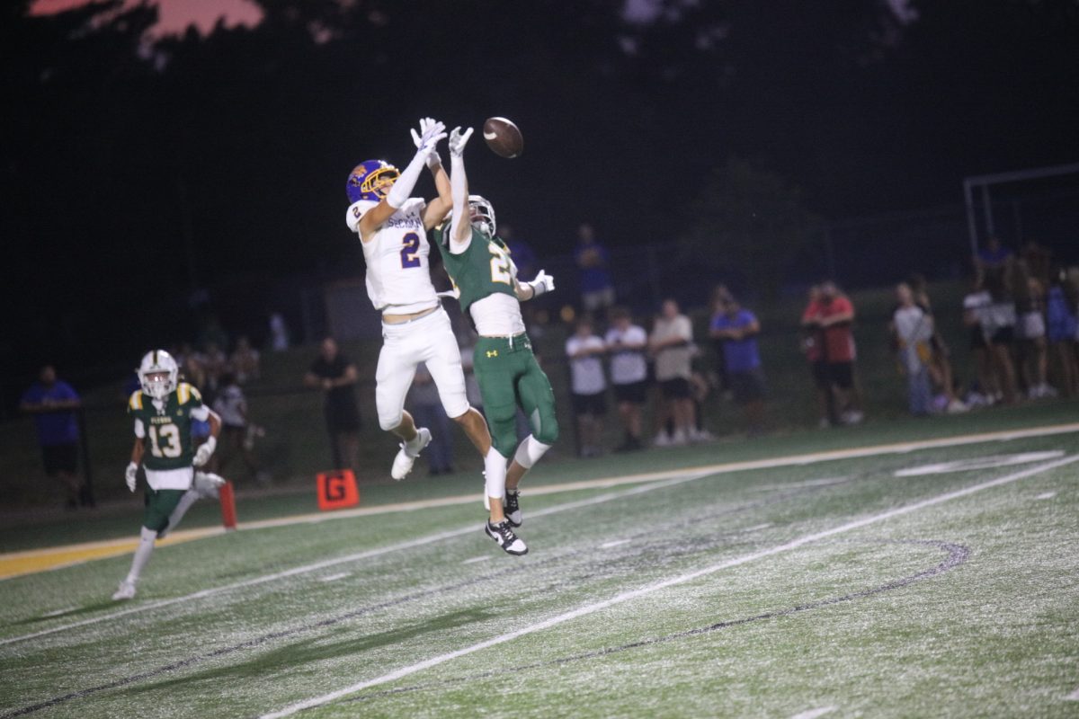Following the first responders and military appreciation celebrations, the Flyers took the field against Seckman. Pictured above, one player from each team jumps for possession of the ball.