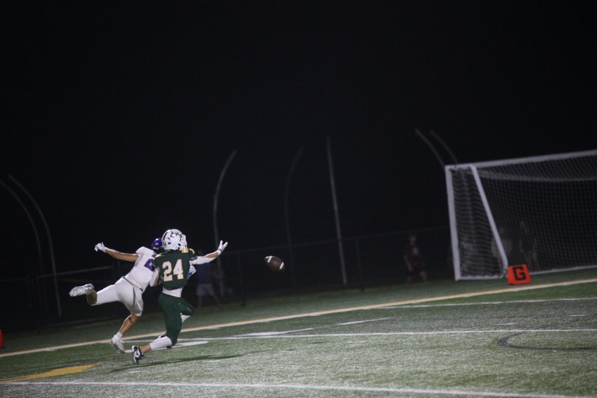 Following the first responders and military appreciation celebrations, the Flyers took the field against Seckman. Pictured above, Lindbergh's CJ Luczak (#24) and a player from Seckman reach to catch the ball, though neither make the play as the ball is too far.