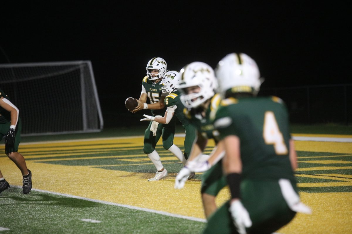 Following the first responders and military appreciation celebrations, the Flyers took the field against Seckman. Pictured above, Lindbergh's Colby Bangert (#15), ball in hand, gets ready to make a play.