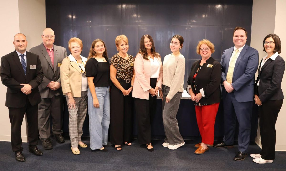 The Mehlville Board of education poses with the outgoing Student Advisors. Pictured left to right: Superintendent of Schools Dr. Jeff Haug, Board Director Jeff Wolman, Board Secretary Jean Pretto, Board President Peggy Hassler, Board Vice President Tori Behlke, Board Director Ann Zimpfer, Board Director Patrick McKelvey and Board Director Serene Wilkinson. Photo courtesy of the Mehlville School District. 