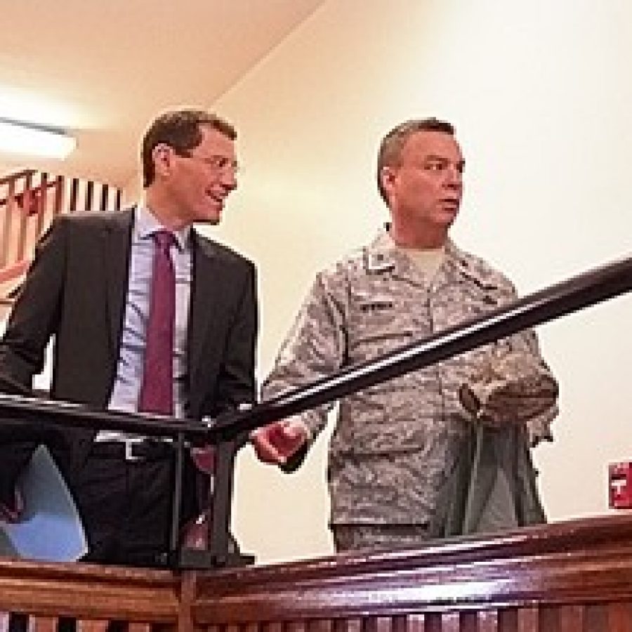 Brig. Gen. David Newman, right, chief of the Missouri National Guard Joint Staff, explains the history of a 150-year-old staircase at Jefferson Barracks to Missouri Treasurer Clint Zweifel during Zweifels tour of the facility last week.Gloria Lloyd photo 