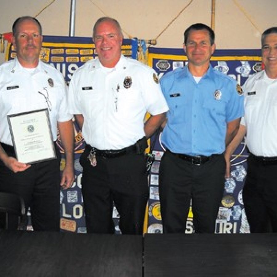 Pictured, from left, are: Capt. Dan Rosenthal, Deputy Chief Tim Dempsey, Pvt. Tim Block and Deputy Chief Dan Furrer.