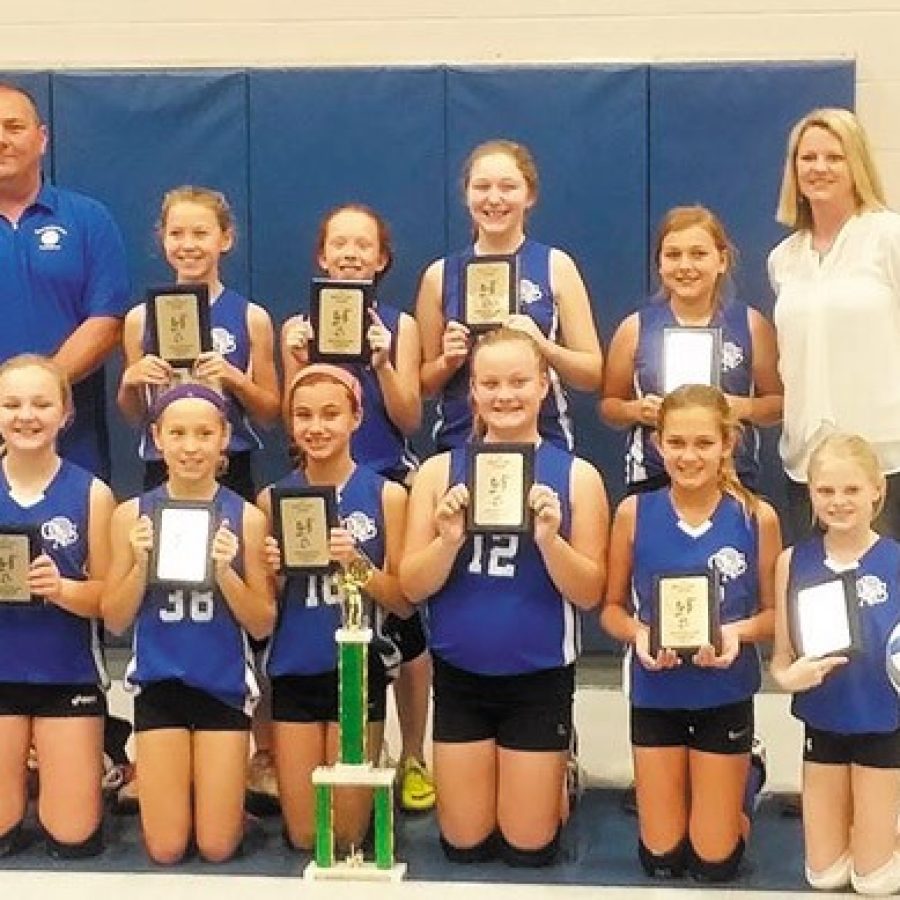 The Queen of All Saints fifth-grade championship volleyball team