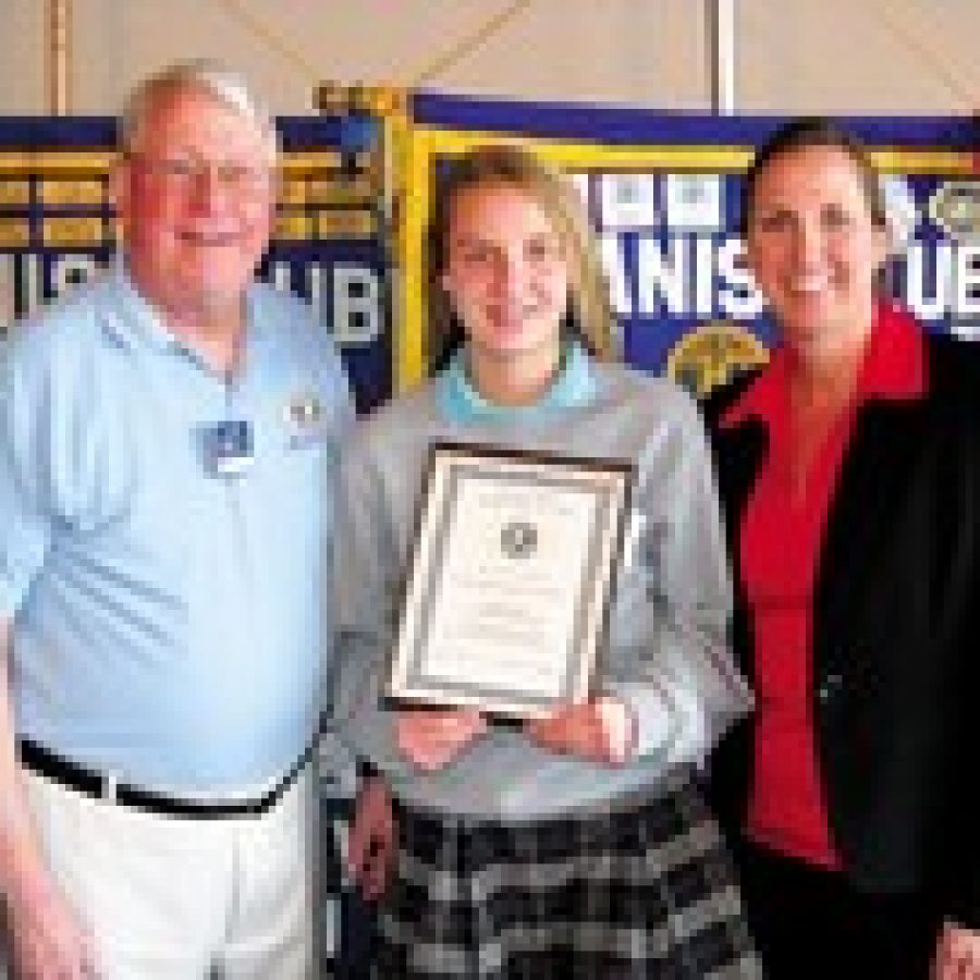 Abigail is shown with Kiwanis Club President Ed Kurmann and her mother, Ann Sutter. 