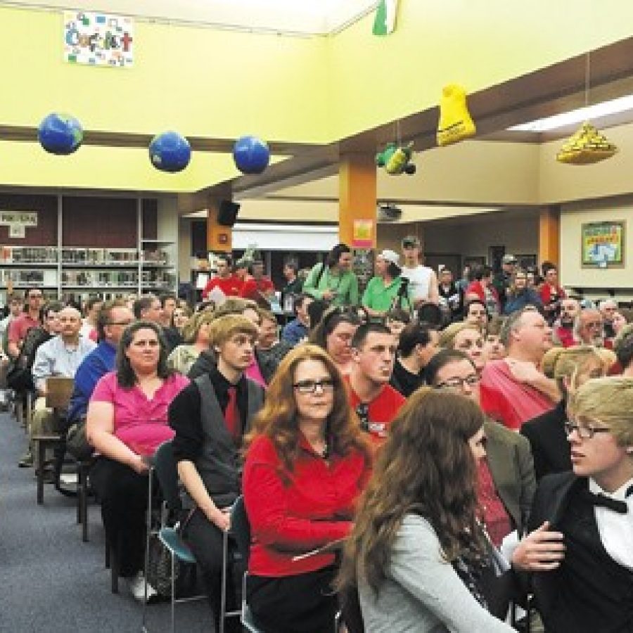 A sea of teachers and students wearing red in support of the districts teaching staff stood out in the crowd of roughly 400 when the board met last week in the Mehlville High School Library for a first look at a list of \$4 million in proposed budget cuts.