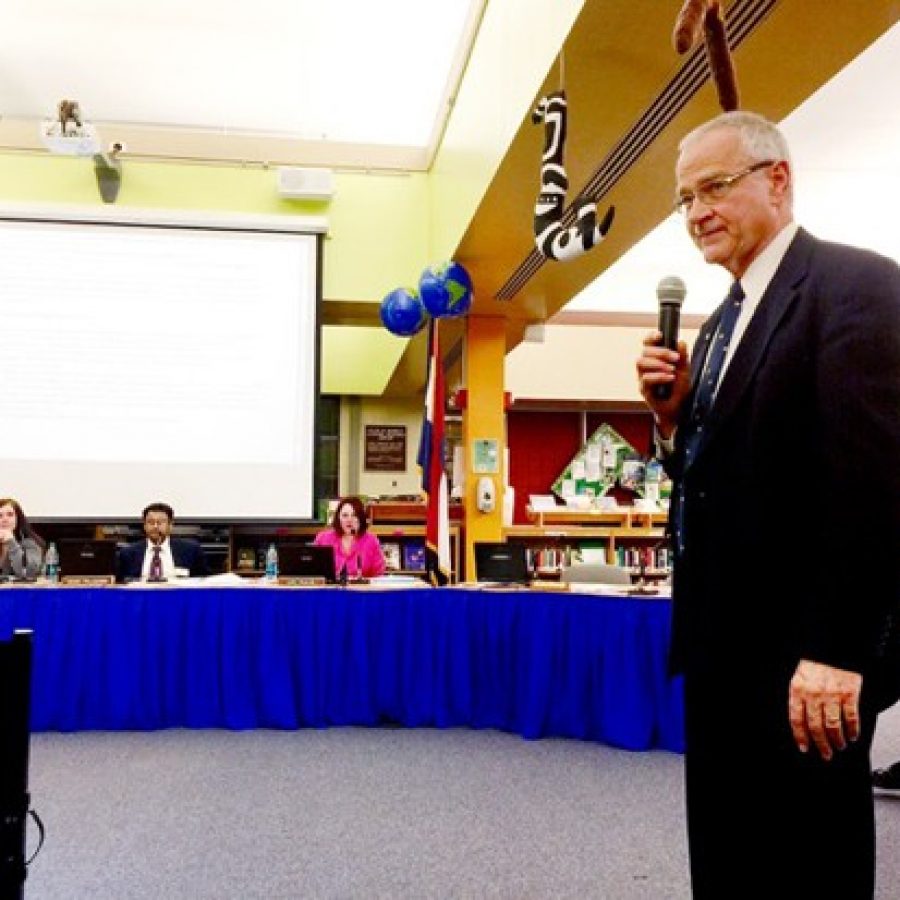 Mehlville Superintendent Norm Ridder, right, presents a list of \$5.3 million in budget cuts that included \$1.3 million from adding VICC students to the Board of Education March 11. Also pictured are board members, from left, Larry Felton, Samantha Stormer, Venki Palamand and Lori Trakas.