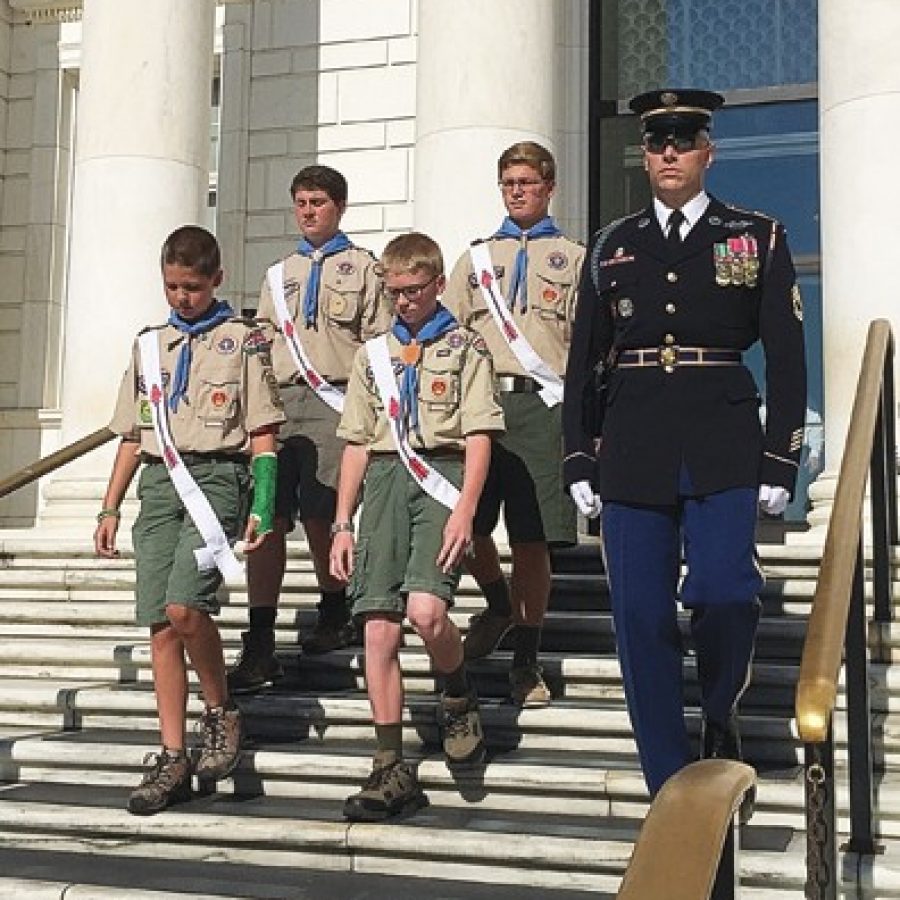 The Troop 824 Honor Guard is pictured with an escort during its visit to Arlington National Cemetery to place a wreath at the Tomb of the Unknown Soldier.