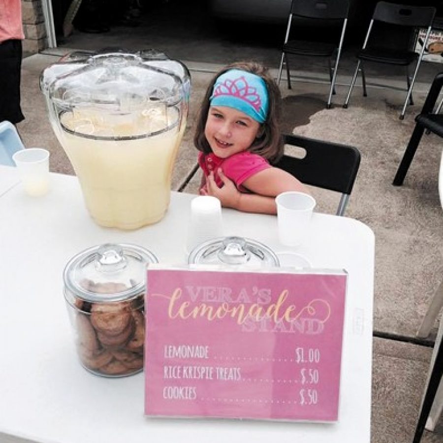 Long Elementary first-grader Vera Stremlau is pictured at her lemonade stand to help make the schools playground more accessible for all of her friends.
