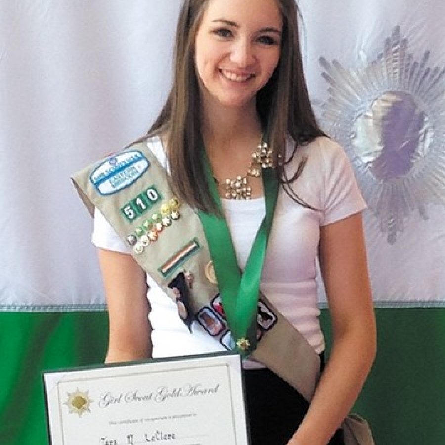 Tara LeClere is shown with her Girl Scout Gold Award, the highest national award in Girl Scouting. 