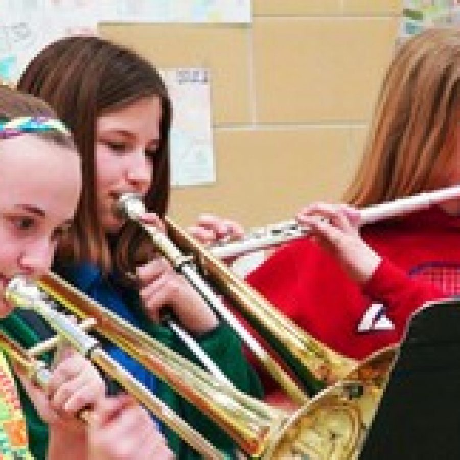 Marley Durham, Morgan Snyder and Rachel Ruggeri show off their musical talents during Washington Middle Schools talent show.
 