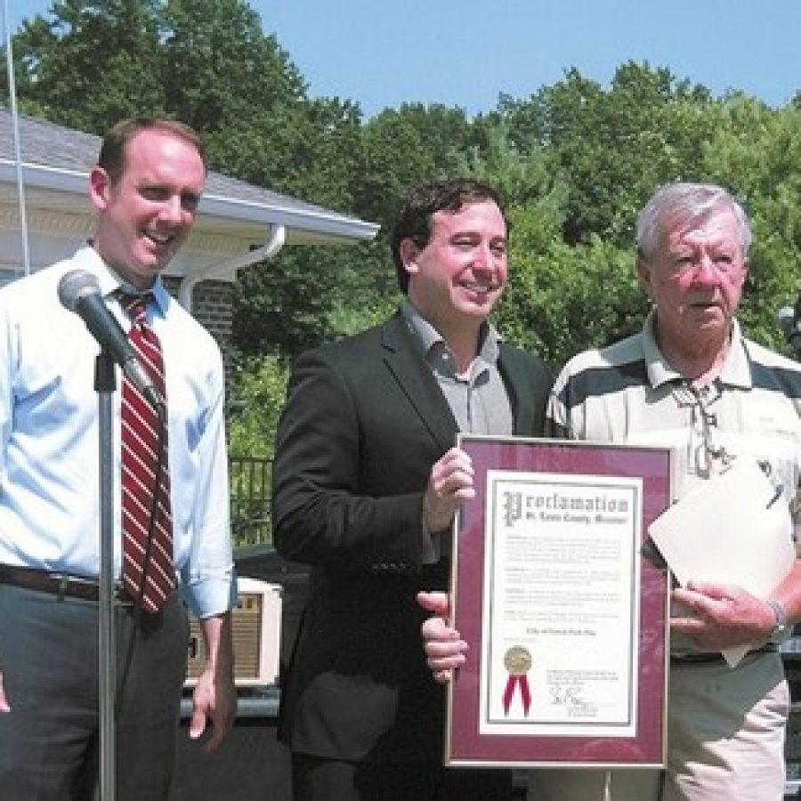 Green Park elected officials, city staff and residents were joined by county and state elected officials July 12 for a celebration to mark the citys 20th anniversary of incorporation. Pictured, from left, are: Sen. Scott Sifton, County Executive Steve Stenger and Mayor Bob Reinagel. 