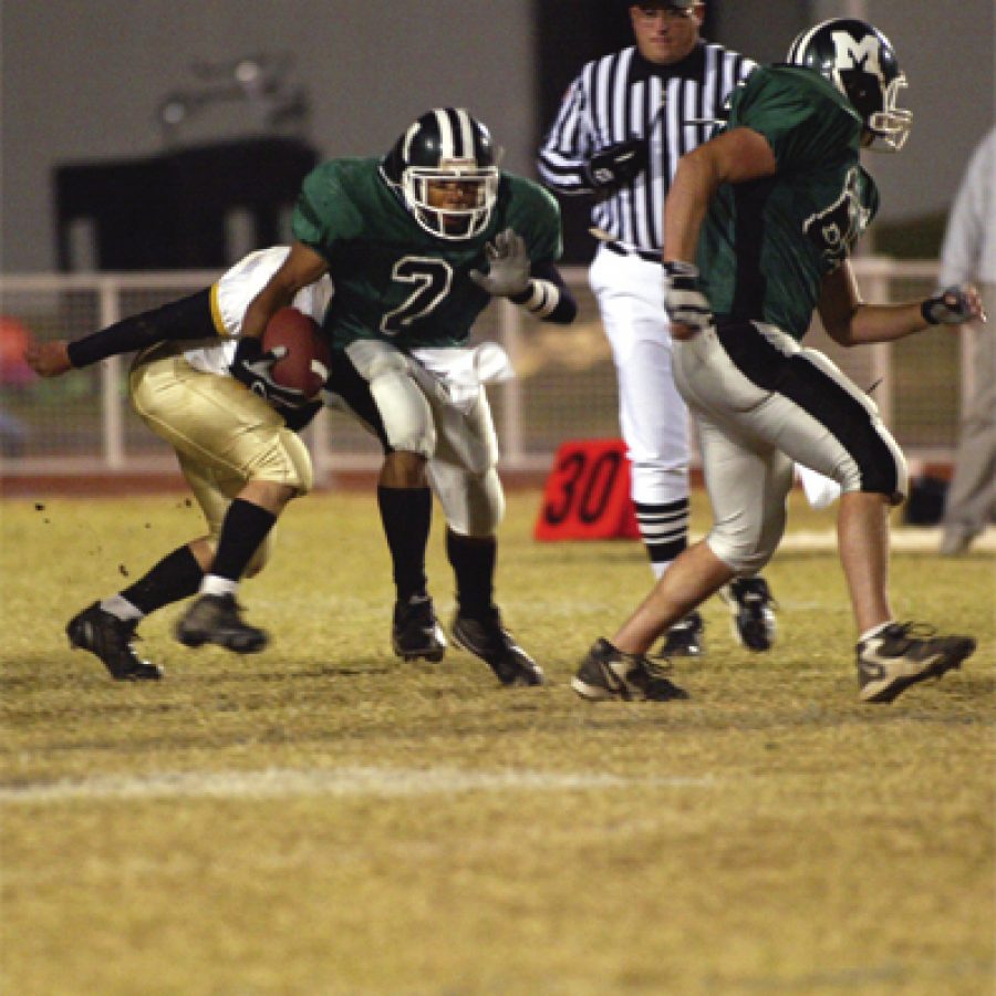 Mehlville running back Jeremy Doss 2 breaks free for an 11-yard gain during the second quarter Friday as the Panthers played host to crosstown rival Oakville.