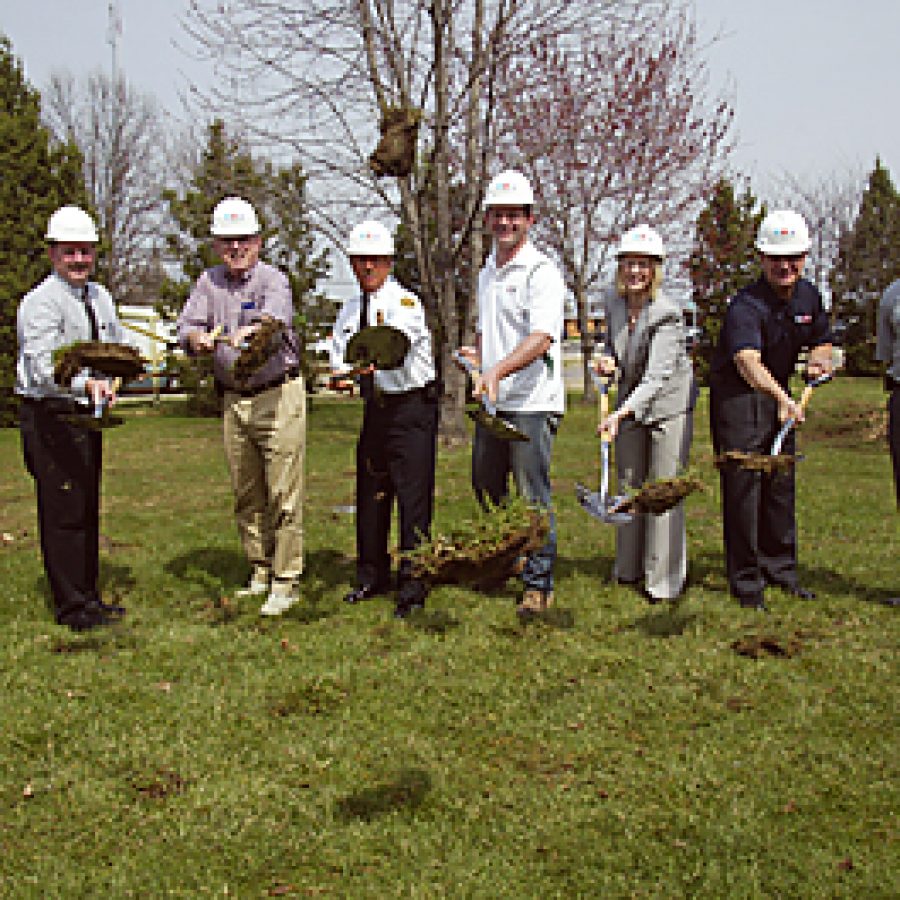 Breaking ground for the new No. 3 Firehouse, from left, are: Lance Woelfel of Archimages, Roy Mangan of Archimages, board Secretary Ed Ryan, Chief Tim White, board Chairman Aaron Hilmer, board Treasurer Bonnie Stegman, Sen. Jim Lembke of Lemay and Josh Foster of the J.E. Foster Building Co., contractor for the project. Bill Milligan photo