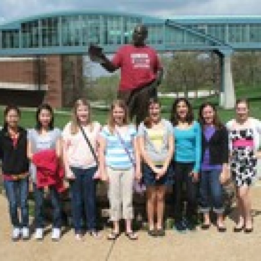 Bernard Middle School seventh-graders, from left, Jenny Ngo, Elizabeth Hong, Ellie Corner, Emily Jackson, Cassidy Vuylsteke, Simone Hanna, Abby Ludwig, and Carolyn Ream earned recognition for their projects at the St. Louis regional National History Day competition. Not pictured is eighth-grader Scott Buback. 