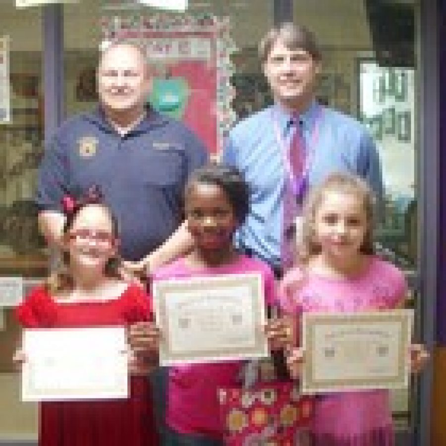 Representatives of the Affton Lodge No. 2635 delivered gift certificates and certificates of recognition to students at Gotsch Intermediate School in Affton School district for participating in the drug awareness poster contest. The lodge gave out three gift certificates valued at $75, $50 and $25. There were 40 participants who all received certificates of recognition. The three winners received gift certificates. Pictured are the winners:  first row left to right, Third place Margret Eyberg, Second place Yazmin Henderson, and first place Megan Hasani. The second row is Drug Awareness Chairman Tom Parchomski and principal Brian Smith.