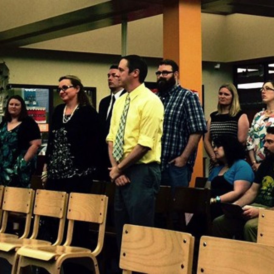 The implementation team for the new Mehlville Choice School of Innovation stands up to be recognized at last weeks school board meeting. Team members include Rogers teacher Lisa Meyers, left, Oakville Elementary Principal Chad Dickemper and Oakville Elementary parent Mike Sita, middle.