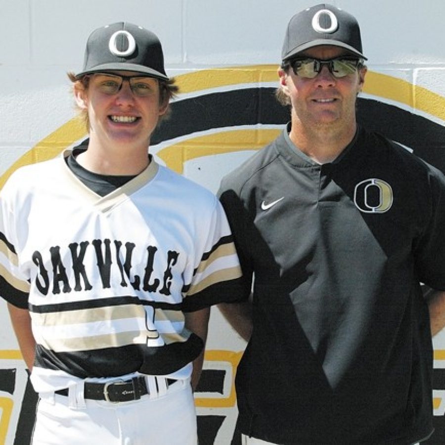 Oakville senior hurler Blake Tribout is pictured with head baseball coach Rich Sturm between games of the Tigers April 16 double header. Blake started the first game against St. Marys and came away with the win.