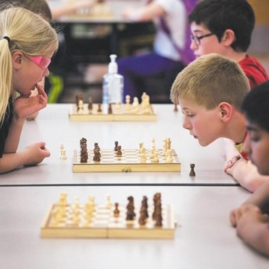 Young chess players make their moves