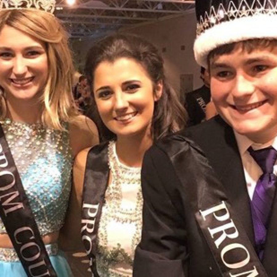 Prom King Matt Schmitt, right, with, from left, Prom Queen Breanna Colombo and Sophie Nelms, a member of the prom court, at Oakville High Schools prom May 7.
