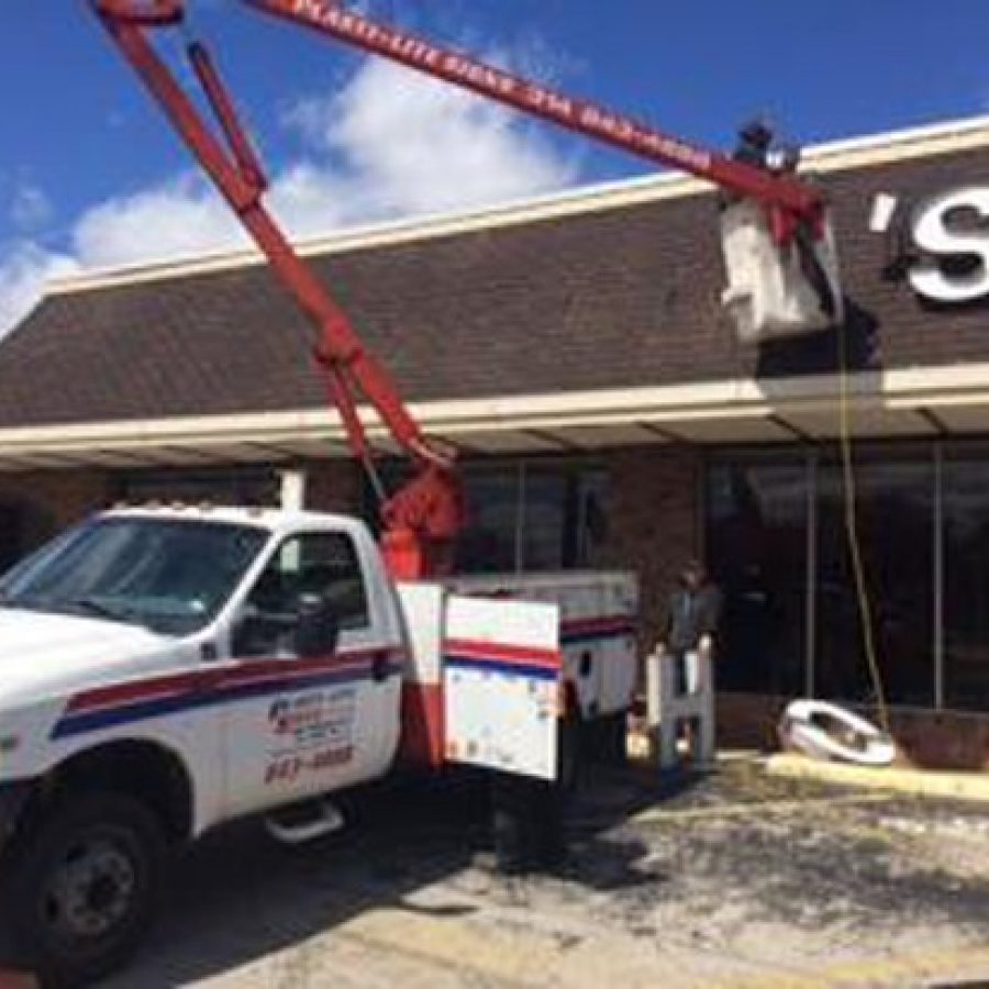 The Sappington-Concord Historical Society posted this photo to Facebook of workers taking down the Johnnys lettering off the front of the former Johnnys Market earlier this month.