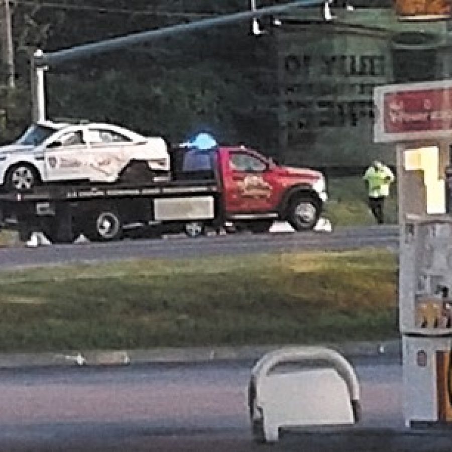 Witness Katelyn Michelle Sterling took this photo of a St. Louis County police car being towed from the scene of a crash on Telegraph Road Sunday.