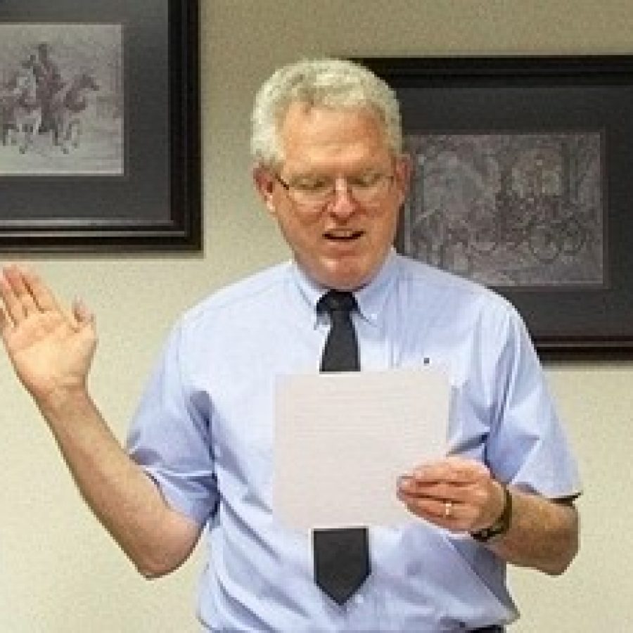 Mehlville Fire Protection District Board of Directors Secretary Ed Ryan takes the oath of office for his second term last week. 