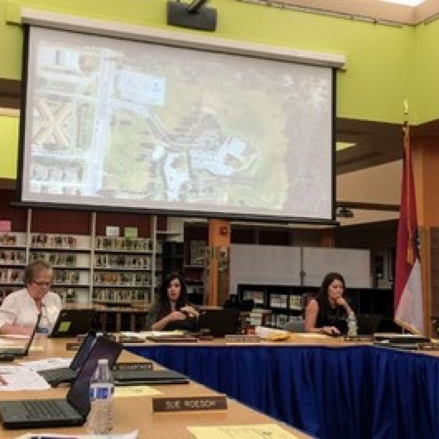 The Mehlville Board of Education talks about whether to sell land next to Oakville Middle School and Wohlwend Elementary to Aldi. Pictured, from left, are: board members Kevin Schartner, Vice President Jean Pretto, President Samantha Stormer, Secretary Lisa Dorsey and Larry Felton. Photo by Gloria Lloyd.
