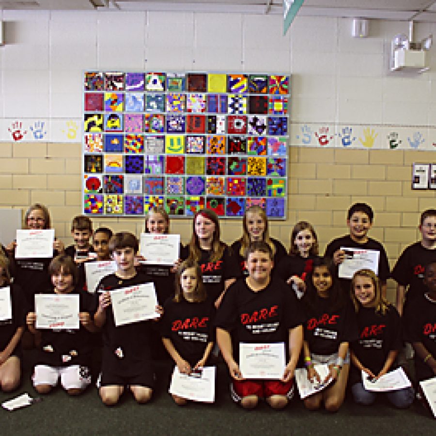 Fifth-graders leave mark on school with original mural