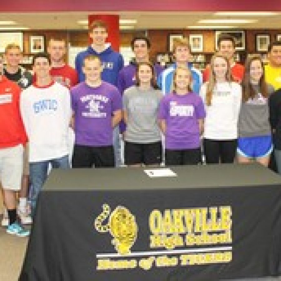 Oakville High School seniors receiving athletic scholarships to several different colleges and universities, back row, from left, are: Ervin Sarajlic, JR Frisella, Elvir Sarajlic, Austin Gillmann, Ryan Brady, Jake Dodge, Cameron Dulle and Adam Roland. Front row, from left, are: Nathan Mischel, Blake Johnson, Nick Kenny, Megan Allen, Dory Kennon, Sarah Koenen, Kristin Sazama, Alexis Pommer and Melissa Brown. Not pictured are Tina Haberberger and Maggie Pike. 