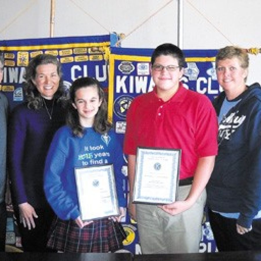 Stephanie Lato of St. Margaret Mary Alacoque Catholic School and Peter Boucher of Bernard Middle School are pictured with their parents, Steve and Laura Lato and Carie and Andre Boucher.