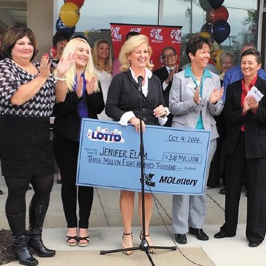 Missouri Lottery Executive Director May Scheve Reardon proclaims real-estate broker Norm Polskys south county agency the luckiest Coldwell Banker office ever as she presents agent Jenifer Elam with a \$3.8 million check. Pictured, from left, are: Kim DeLapp of Arnold, Jamie Bone of Lemay, Reardon, Elam and Elams partner, Lea Harthcock.