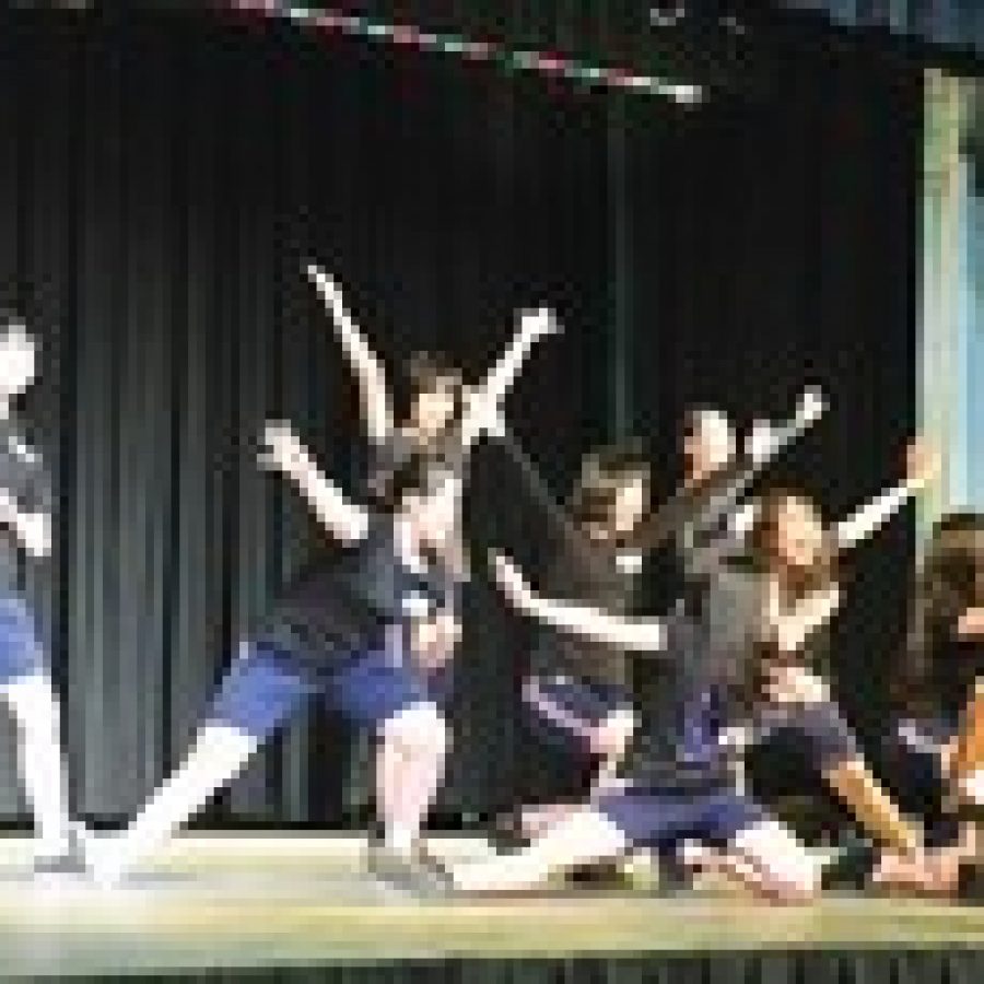 Students from Kyoto, Japan, give a dance presentation for their Notre Dame hosts during their recent visit to St. Louis. 