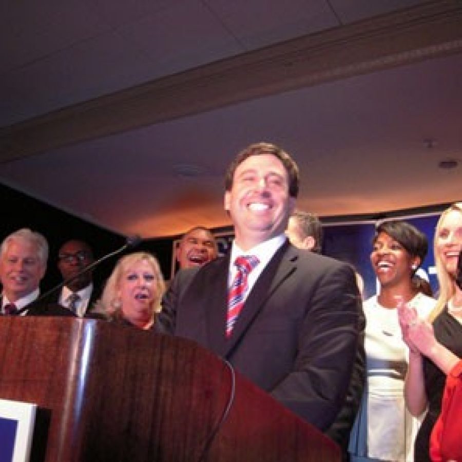 County Executive-Elect Steve Stenger at his victory party Nov. 4. Pictured, front row, from left, are: 5th District Councilman Pat Dolan, D-Richmond Heights; Stengers sister Debbie Mourning; Stenger; Leslie Broadnax; Stengers wife Allison; and former Sen. Betty Thompson.