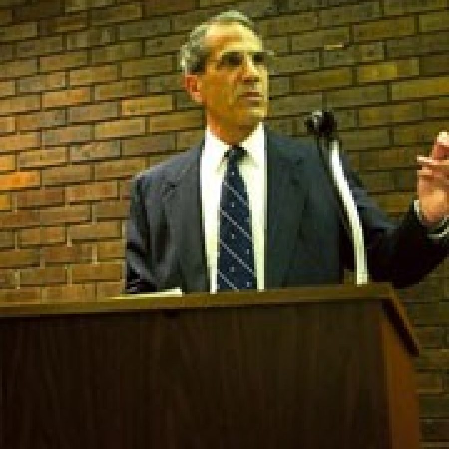 Former Ward 3 Alderman Jerry Miguel at the podium during a campaign event when he ran for re-election in 2004.