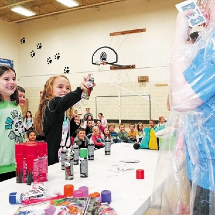 Blades Elementary School students recently celebrated their efforts jumping rope to raise money for the American Heart Association. Students lined up and were able to squirt Blades Assistant Principal Laurie Tretter-Larkin and physical education teacher Brandon Schulte with Silly String, shaving cream and feathers. Above, second-grader Izabel Paluczak takes her shot at Tretter-Larkin with some Silly String. Also pictured is second-grader Kaitlyn Amsler.