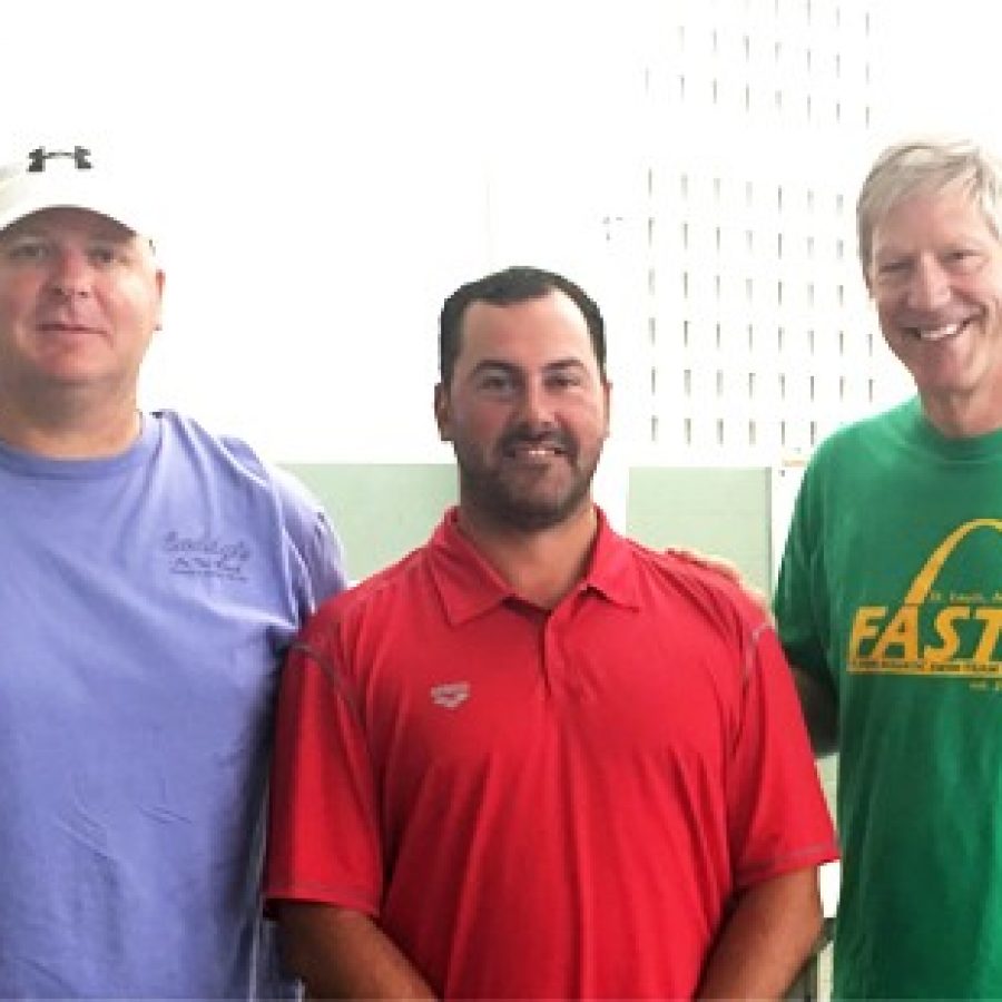 Raz Cuparencu, center, is the new national team coach for the Flyers Aquatic Swim Team, or FAST. He is pictured with Duane Punnewaert, left, president of the FAST board, and Jim Halliburton,  FAST head coach.