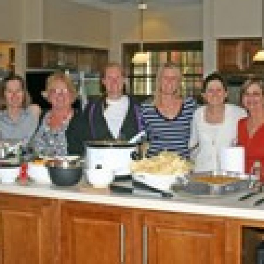 Teachers, from left, Alisha Oetting, Ann Zimpfer, Emily LeFlore, Jenn Koenig, Sheila Serati and Debbie Hearst whipped up a meal consisting of tacos, casseroles, salad and lots of desserts for the Ronald McDonald House guests, which can run as many as 50 people. One of the teachers had previously done some volunteer work at the house and found the experience so rewarding that she gathered a group of co-workers to use their culinary skills for a great cause.  
